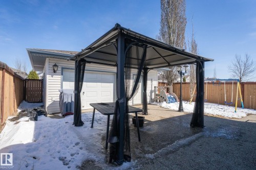 Detached two-car garage with white vinyl siding - 1904 36 Avenue, Edmonton, AB - Outdoor