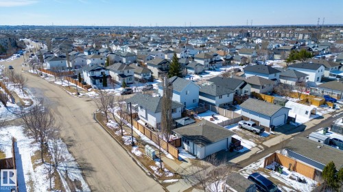 Residential neighborhood featuring detached homes with various rooflines and exterior finishes - 1904 36 Avenue, Edmonton, AB - Outdoor With View