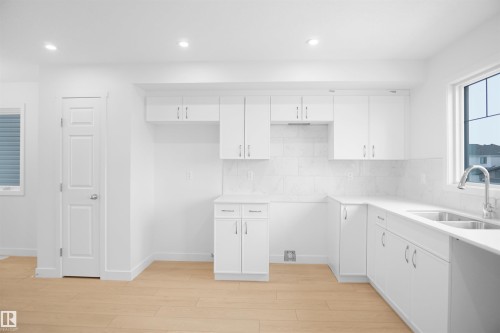 651 176 Avenue, Edmonton, AB - Indoor Photo Showing Kitchen With Double Sink