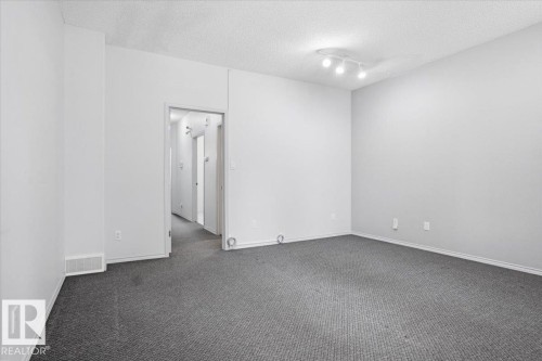 #3 10235 111 St Nw, Edmonton, AB - Indoor Photo Showing Other Room