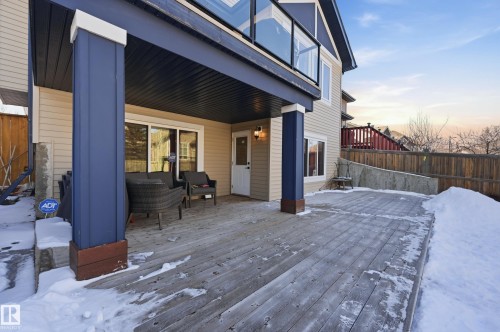 The property features a large wooden deck, offering ample outdoor living space - 2018 Armitage Green, Edmonton, AB - Outdoor With Deck Patio Veranda With Exterior