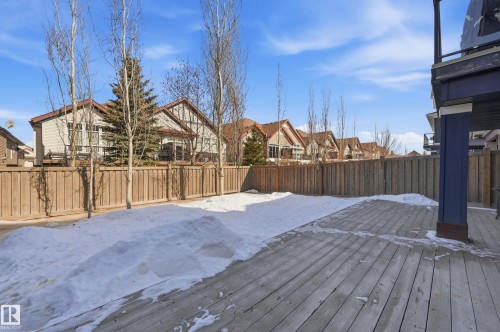 The property includes a spacious wood deck and a fenced yard - 2018 Armitage Green, Edmonton, AB - Outdoor With Deck Patio Veranda