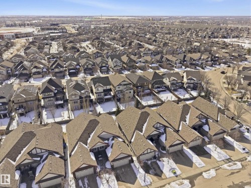 An aerial view of the property and surrounding neighbourhood, featuring a clear sky - 2018 Armitage Green, Edmonton, AB - Outdoor With View