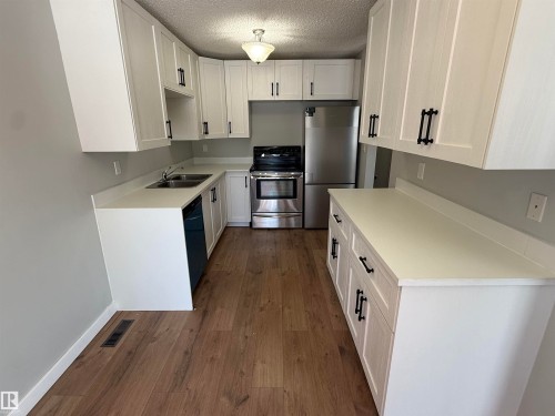 10654 Beaumaris Road, Edmonton, AB - Indoor Photo Showing Kitchen With Double Sink