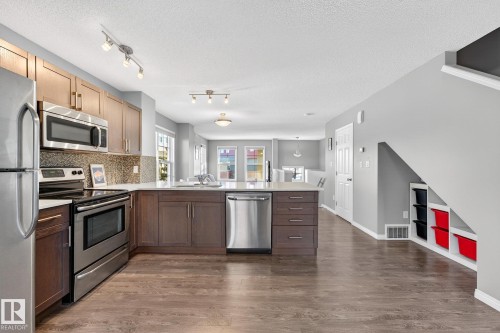 17 4029 Orchards Drive, Edmonton, AB - Indoor Photo Showing Kitchen With Stainless Steel Kitchen With Upgraded Kitchen