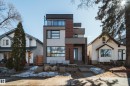 Contemporary multi-level residence featuring a flat roofline and a glass-paneled balcony - 9625 101 Street, Edmonton, AB  - Outdoor With Facade 