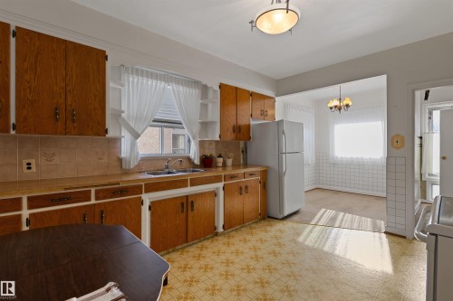 10842 110 Street, Edmonton, AB - Indoor Photo Showing Kitchen With Double Sink