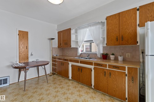 10842 110 Street, Edmonton, AB - Indoor Photo Showing Kitchen With Double Sink