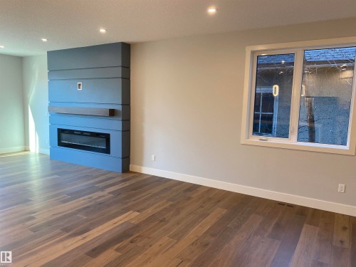 9515 75 Avenue, Edmonton, AB - Indoor Photo Showing Other Room With Fireplace