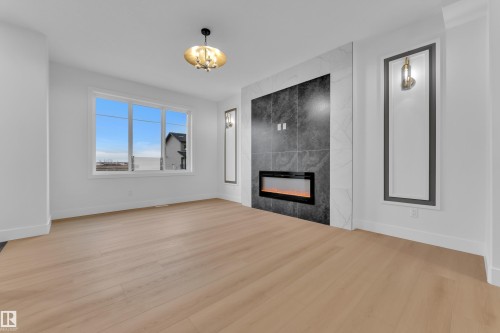 456 Crystal Creek Link, Leduc, AB - Indoor With Fireplace