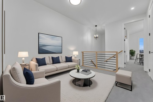 Open-concept living space with vaulted ceilings, contemporary stair railing, recessed lighting, and light gray carpet - 456 Crystal Creek Link, Leduc, AB - Indoor Photo Showing Living Room