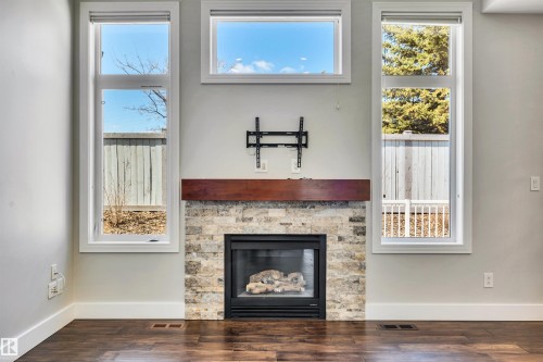 3 61 Lafleur Drive, St. Albert, AB - Indoor Photo Showing Other Room With Fireplace