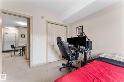 The property features neutral-toned walls, carpeted floors, and a double-door closet - 
