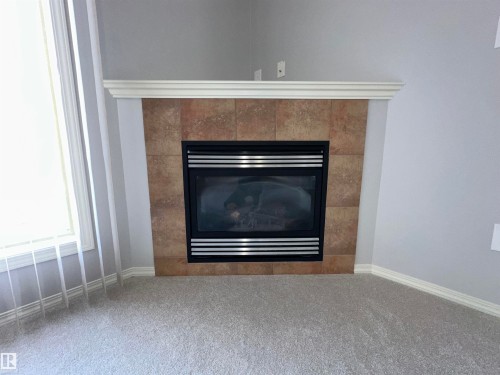 16122 131A Street, Edmonton, AB - Indoor Photo Showing Living Room With Fireplace