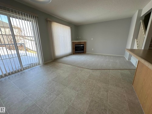 16122 131A Street, Edmonton, AB - Indoor Photo Showing Other Room With Fireplace