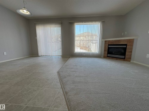 16122 131A Street, Edmonton, AB - Indoor Photo Showing Living Room With Fireplace