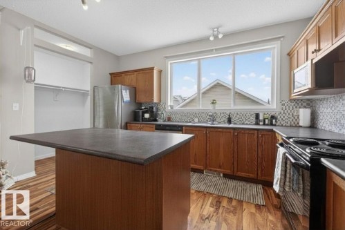 7704 16 Avenue, Edmonton, AB - Indoor Photo Showing Kitchen