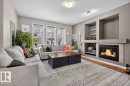 7704 16 Avenue, Edmonton, AB  - Indoor Photo Showing Living Room With Fireplace 