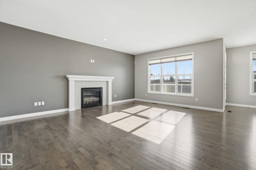 3875 Agar Green, Edmonton, AB - Indoor Photo Showing Living Room With Fireplace
