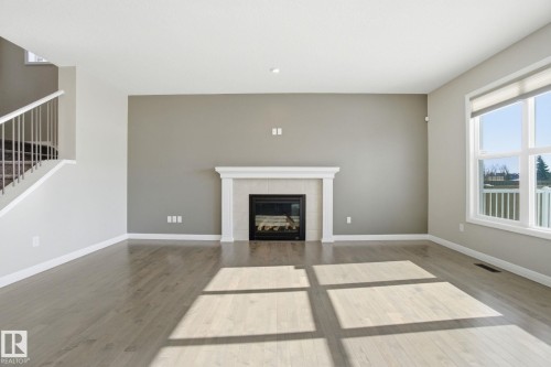 3875 Agar Green, Edmonton, AB - Indoor Photo Showing Living Room With Fireplace