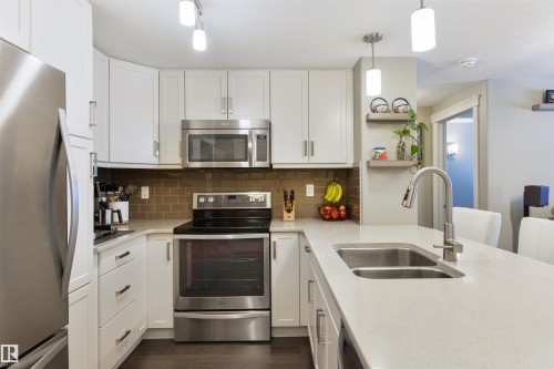 219 7508 Getty Gate Gate, Edmonton, AB - Indoor Photo Showing Kitchen With Double Sink With Upgraded Kitchen