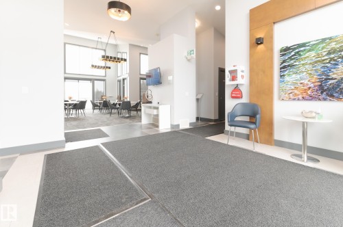 Social Area  Fireplace  Pool Table  Dart Boards and Coffee Station  Exercise Room  Banquet Room  Spacious Kitchenette  Flex Space For Meetings, Crafts, Card Tournaments - #207 50 Heatherglen Dr, Spruce Grove, AB - Indoor Photo Showing Other Room