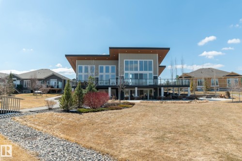 Social Area  Fireplace  Pool Table  Dart Boards and Coffee Station  Exercise Room  Banquet Room  Spacious Kitchenette  Flex Space For Meetings, Crafts, Card Tournaments - #207 50 Heatherglen Dr, Spruce Grove, AB - Outdoor With Deck Patio Veranda