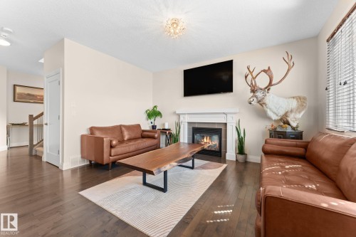8 Spring Bay, Spruce Grove, AB - Indoor Photo Showing Living Room With Fireplace