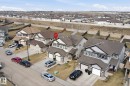 Contemporary two-story residence featuring light-colored siding and a dark trim - 3533 11 Street, Edmonton, AB  - Outdoor With Facade 