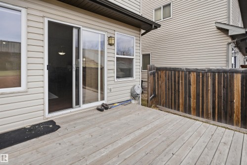 Expansive wood deck with a sliding glass door entry - 3533 11 Street, Edmonton, AB - Outdoor With Deck Patio Veranda With Exterior