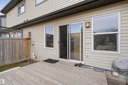 Rear exterior with light-toned horizontal siding - 3533 11 Street, Edmonton, AB - Outdoor With Exterior