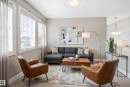 Bright interior room featuring a window with horizontal blinds, light-toned walls, and carpet flooring - 3533 11 Street, Edmonton, AB  - Indoor Photo Showing Bedroom 