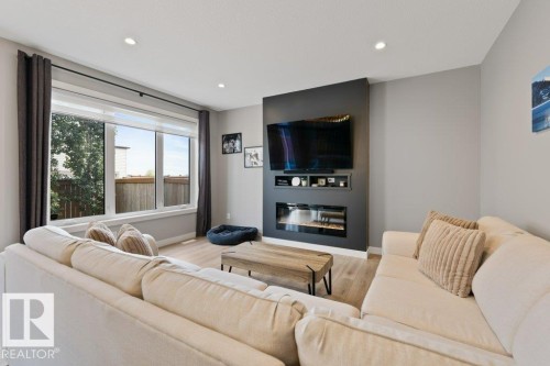 20008 18 Avenue, Edmonton, AB - Indoor Photo Showing Living Room With Fireplace