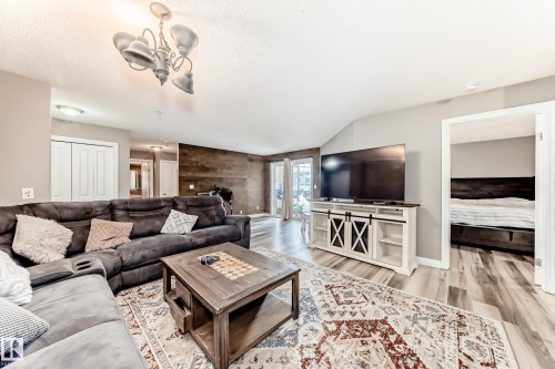 102 16221 95 Street, Edmonton, AB - Indoor Photo Showing Living Room