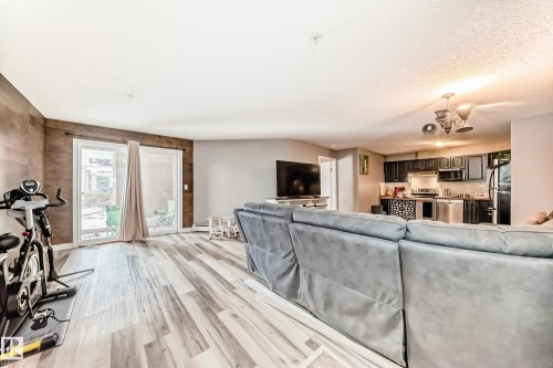 102 16221 95 Street, Edmonton, AB - Indoor Photo Showing Living Room