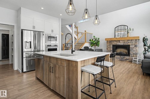 34 Riverhill Crescent, St. Albert, AB - Indoor Photo Showing Kitchen With Fireplace With Upgraded Kitchen