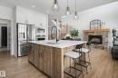 34 Riverhill Crescent, St. Albert, AB  - Indoor Photo Showing Kitchen With Fireplace With Upgraded Kitchen 