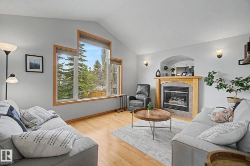 807 Oakland Place, Devon, AB - Indoor Photo Showing Living Room With Fireplace