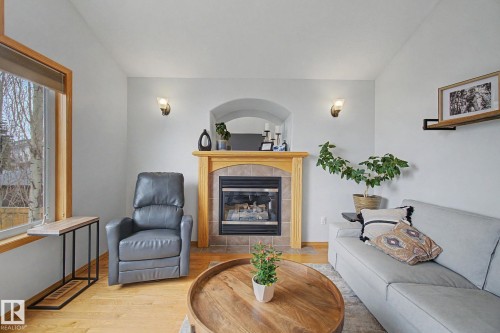 807 Oakland Place, Devon, AB - Indoor Photo Showing Living Room With Fireplace