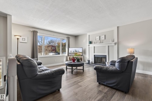 4 Bruyer Crescent, Cold Lake, AB - Indoor Photo Showing Living Room With Fireplace
