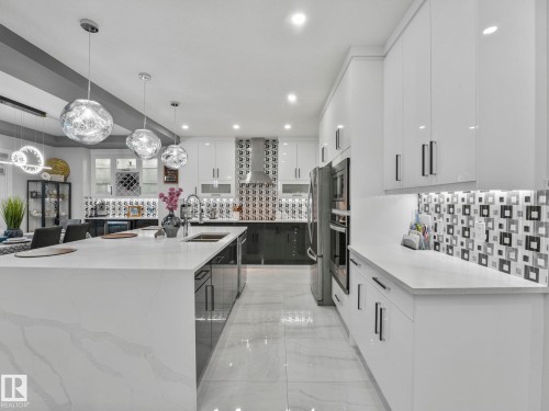 4703 41 Street, Beaumont, AB - Indoor Photo Showing Kitchen With Double Sink With Upgraded Kitchen