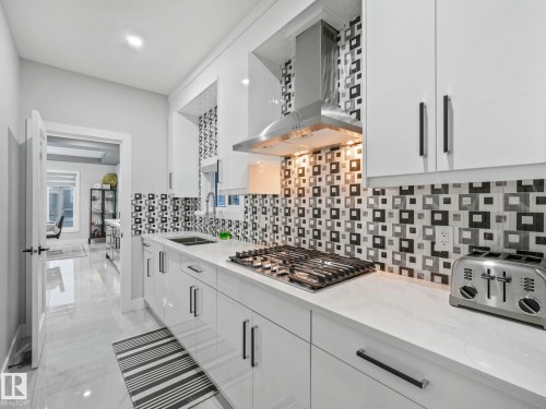 4703 41 Street, Beaumont, AB - Indoor Photo Showing Kitchen With Double Sink With Upgraded Kitchen