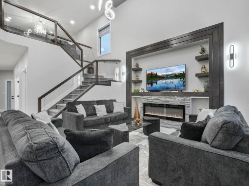4703 41 Street, Beaumont, AB - Indoor Photo Showing Living Room With Fireplace