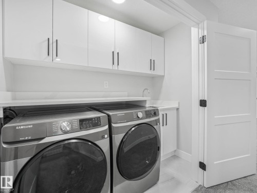 4703 41 Street, Beaumont, AB - Indoor Photo Showing Laundry Room