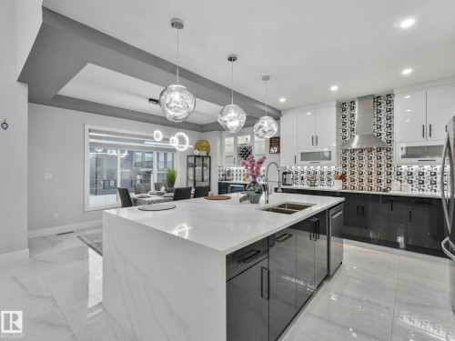 4703 41 Street, Beaumont, AB - Indoor Photo Showing Kitchen With Double Sink With Upgraded Kitchen