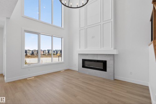16716 34 Avenue, Edmonton, AB - Indoor Photo Showing Living Room With Fireplace