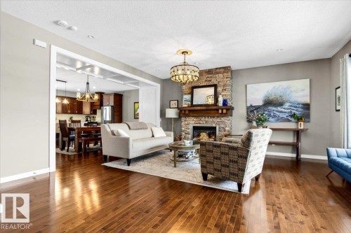 8508 Summerside Grande Boulevard, Edmonton, AB - Indoor Photo Showing Living Room With Fireplace