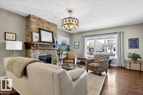 8508 Summerside Grande Boulevard, Edmonton, AB - Indoor Photo Showing Living Room With Fireplace