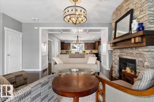 8508 Summerside Grande Boulevard, Edmonton, AB - Indoor Photo Showing Living Room With Fireplace