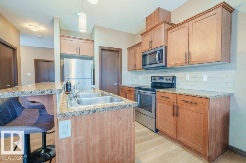 11904 22 Avenue, Edmonton, AB - Indoor Photo Showing Kitchen With Double Sink